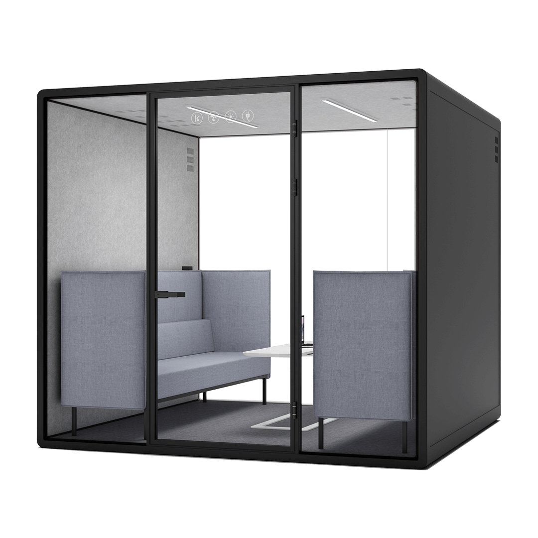 A soundproof work pod with a comfortable chair and desk, ideal for individual work or phone calls